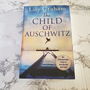 Source Unknown — The Child of Auschwitz in Blue and Cream